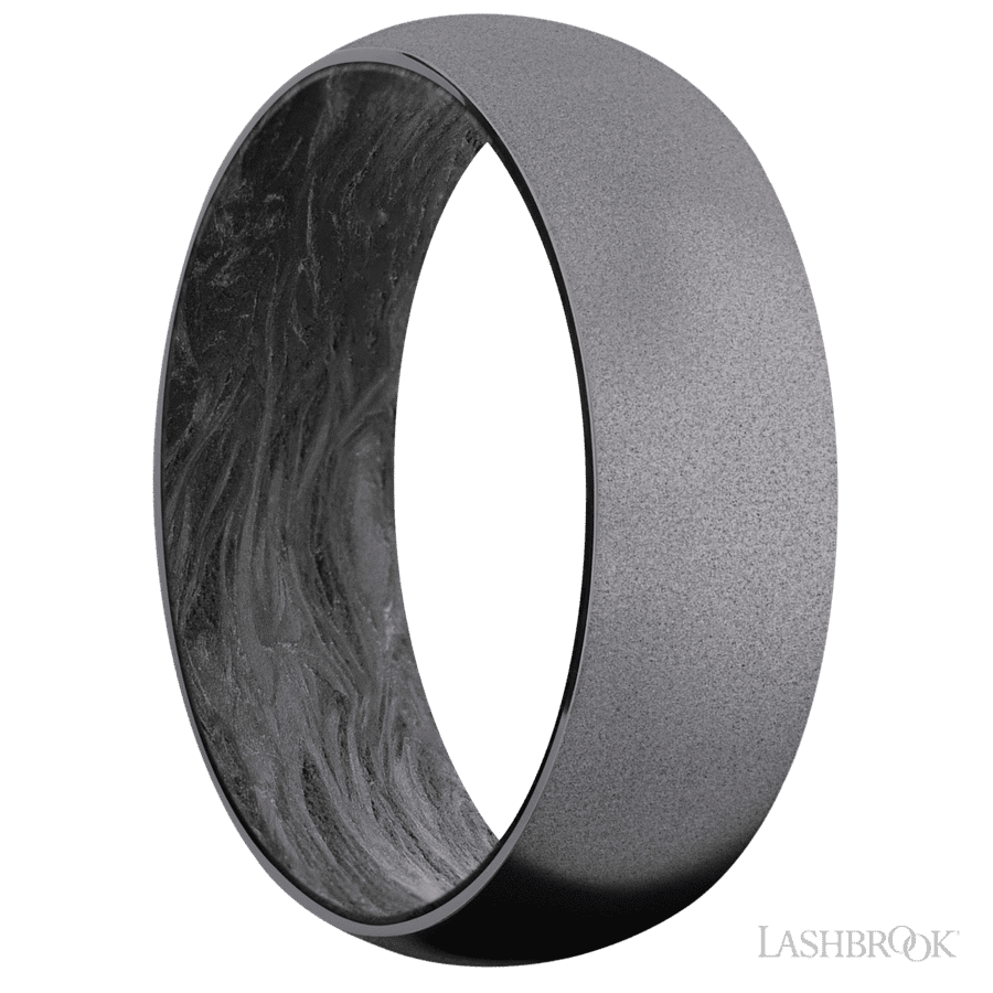 7 mm wide Domed Tantalum band featuring a Forged Carbon Fiber sleeve