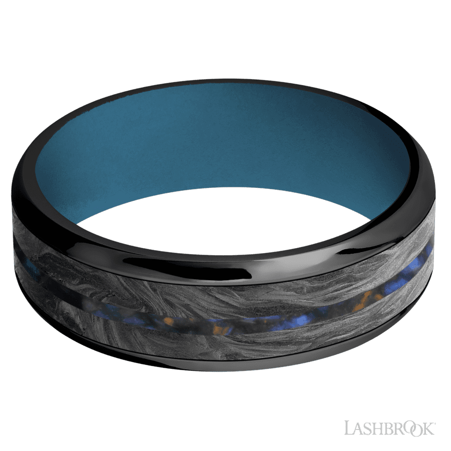 7 mm wide Beveled Zirconium band featuring inlays of Forged Carbon Fiber and Blue Tiger Eye also featuring a Royal Blue sleeve